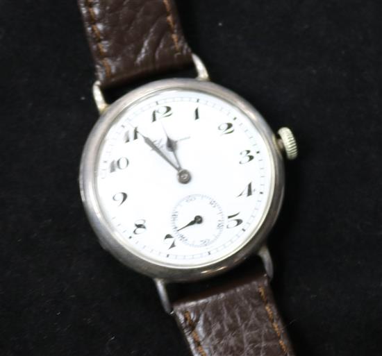 A gentlemans early 20th century silver Longines wrist watch.